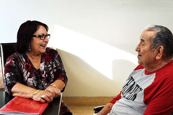 Gloria Sock, First Nations Liaison Officer, with a patient at Stella-Maris-de-Kent Hospital. 
