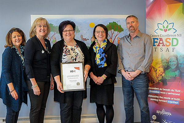 From left to right: Maria DesRoches, Regional Coordinator of the New Brunswick FASD Centre of Excellence; Dr. Nicole LeBlanc, Regional Chief of Staff for Vitalité Health Network and Medical Director for the New Brunswick FASD Centre of Excellence; Annette Cormier, Manager of the New Brunswick FASD Centre of Excellence; Michelyne Paulin, Chairperson of the Board of Directors of Vitalité Health Network; Ken Edwards, Chairperson of the Parent Advisory Committee